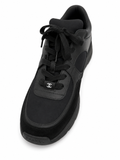 Baskets Chanel Runner en cuir et daim noir