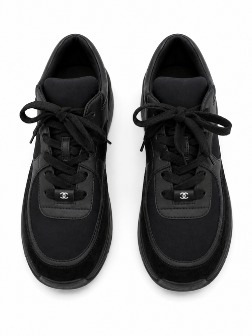 Baskets Chanel Runner en cuir et daim noir